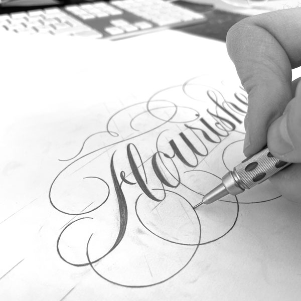 word flourishes drawn with pencil<br />
