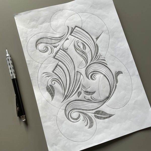 Blackletter B with flourishes