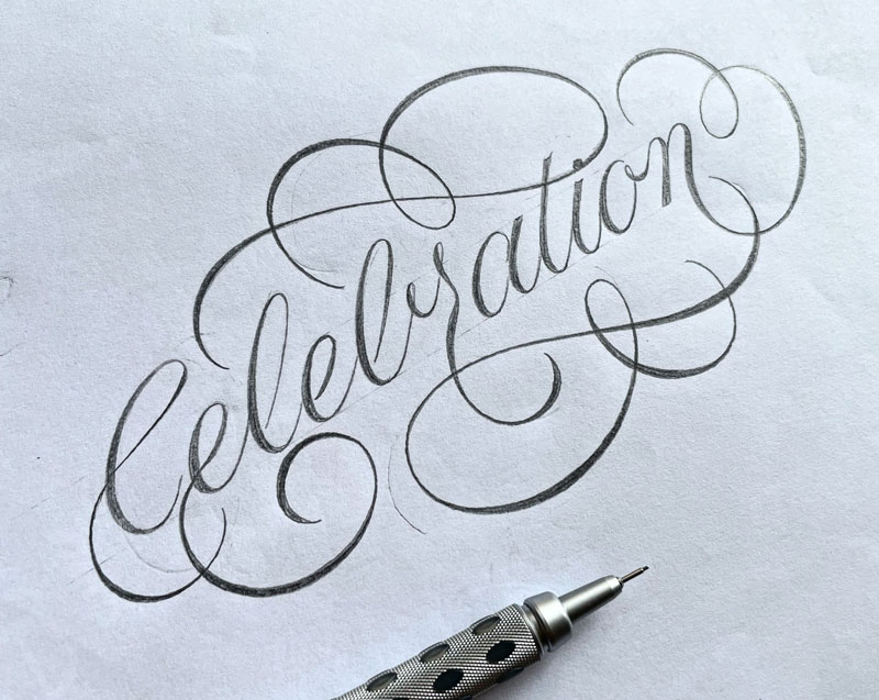 'Celebration' drawn with flourishes around