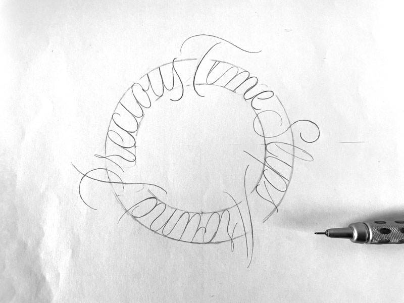 Written letters with pencil in a circle