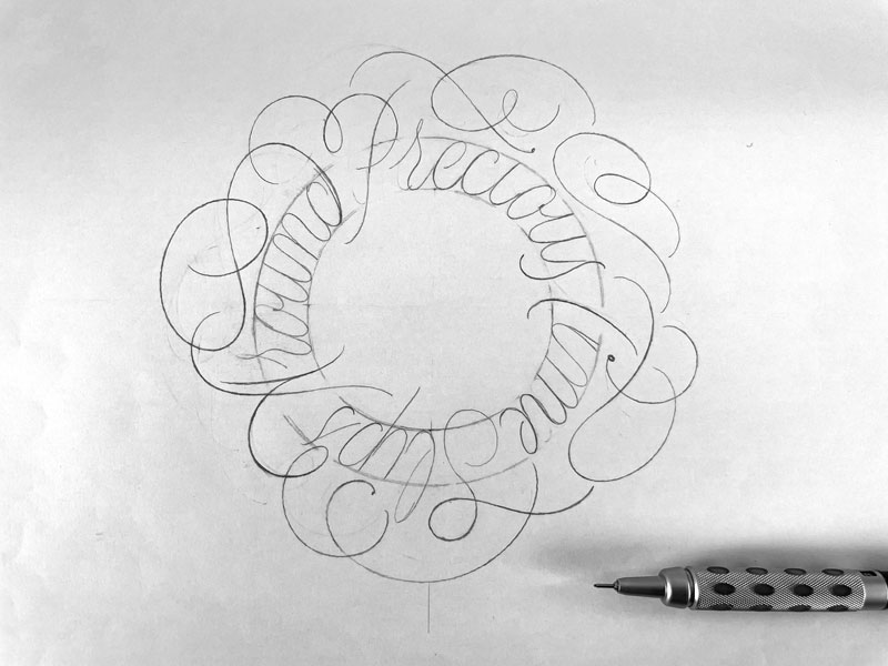 Letters on a circle with flourishes as a monoline