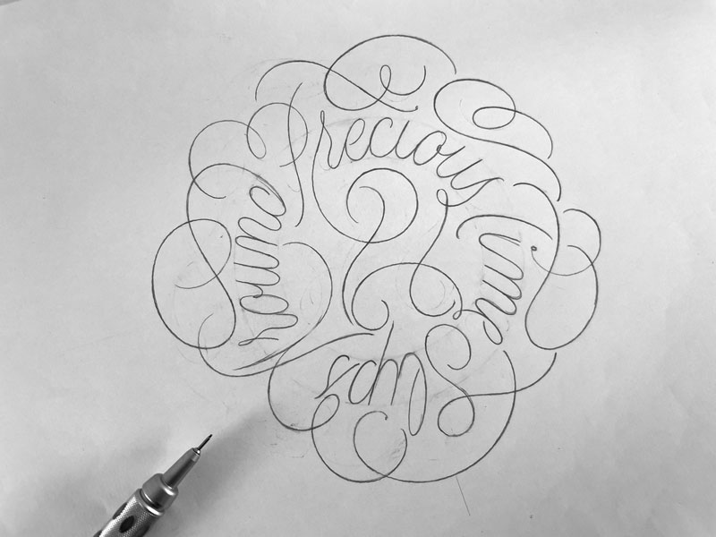 Letters on a circle as a complete composition with flourishes
