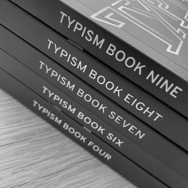Typism books piled up